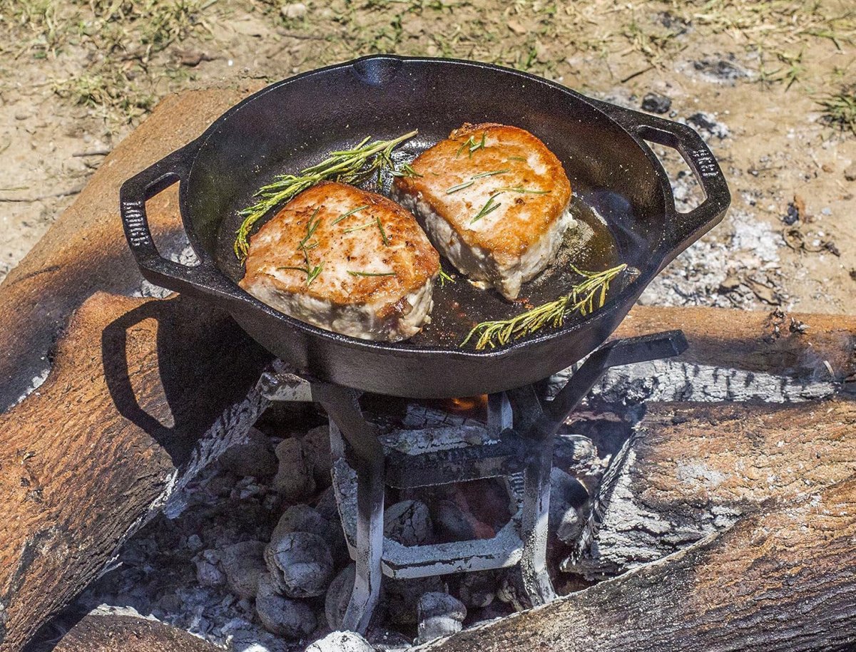 Turn Your Fire Pit Into a Griddle With These Hot Accessories Cast-Iron Cook-It-All Kit and Stand