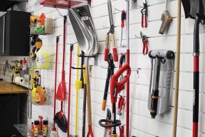 Proslat 88102 PVC Slatwall with lots of gardening tools displayed