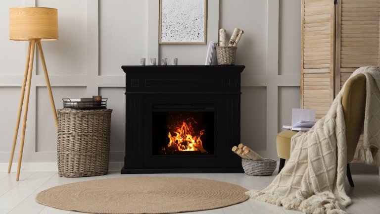 Cozy room interior with electric fireplace and stylish furniture