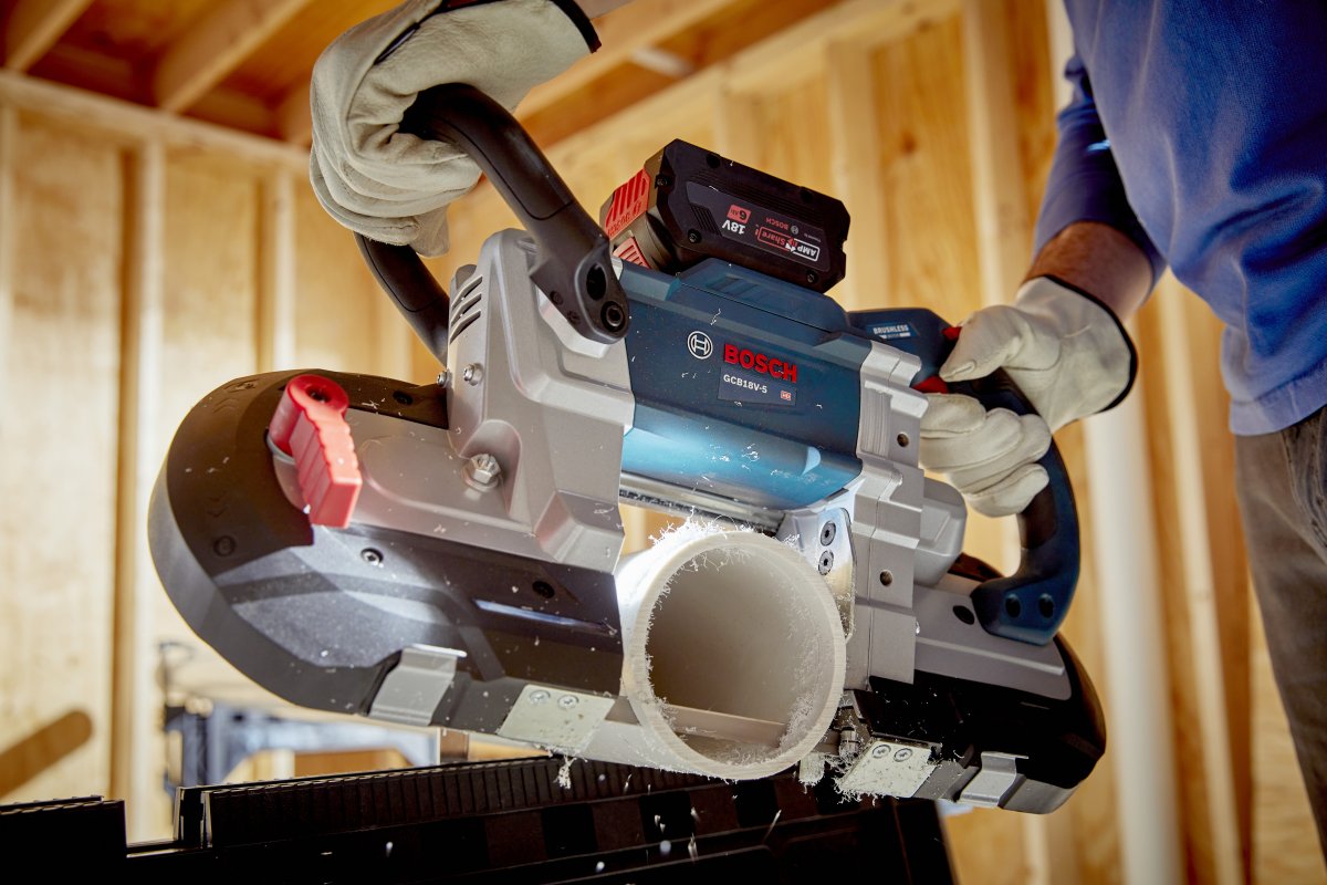 Bosch 18V 5-Inch Deep Cut Bandsaw in use cutting PVC pipe