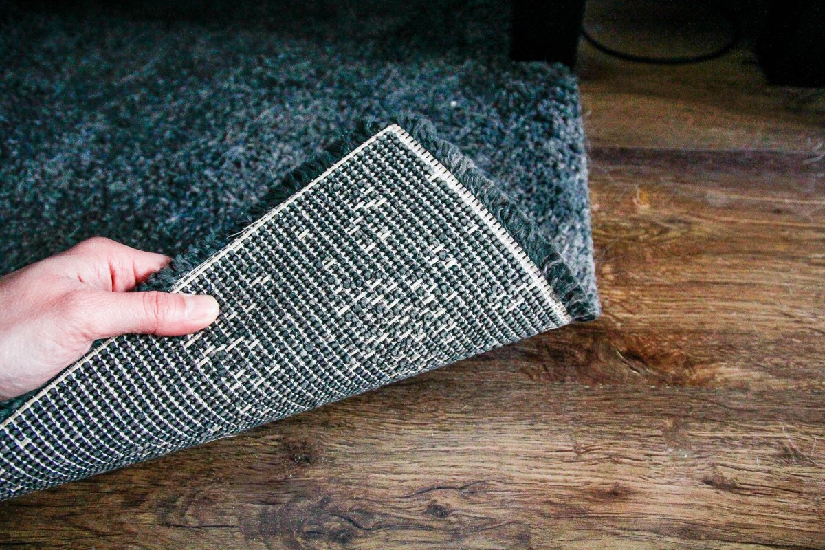Looking underneath the area rug
