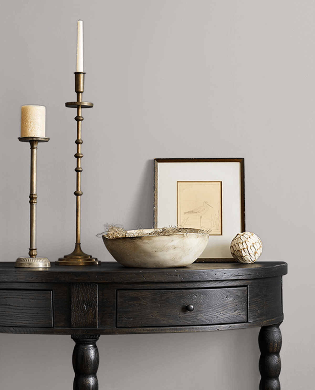Sherwin-Williams Essential Gray neutral paint color on an interior wall.