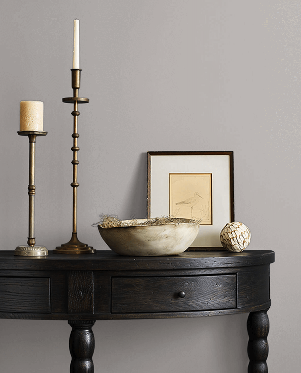 Sherwin-Williams Essential Gray neutral paint color on an interior wall.