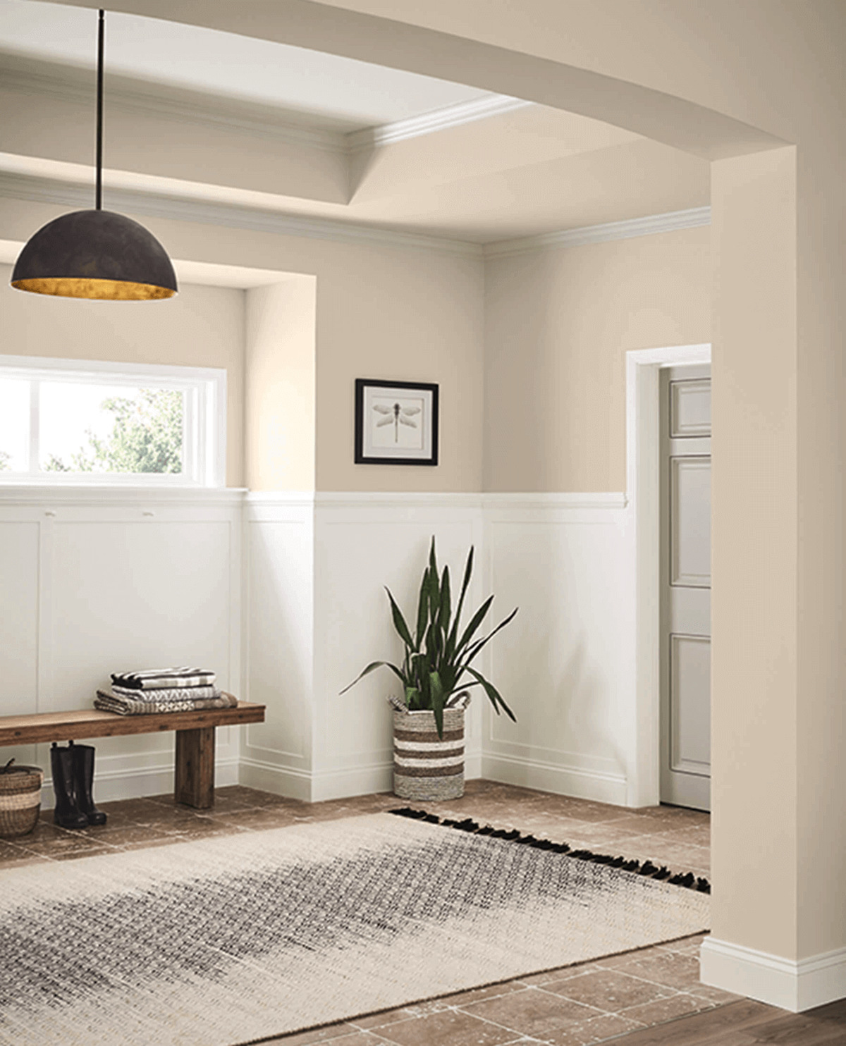 Sherwin-Williams Natural Linen neutral paint color on entryway walls.