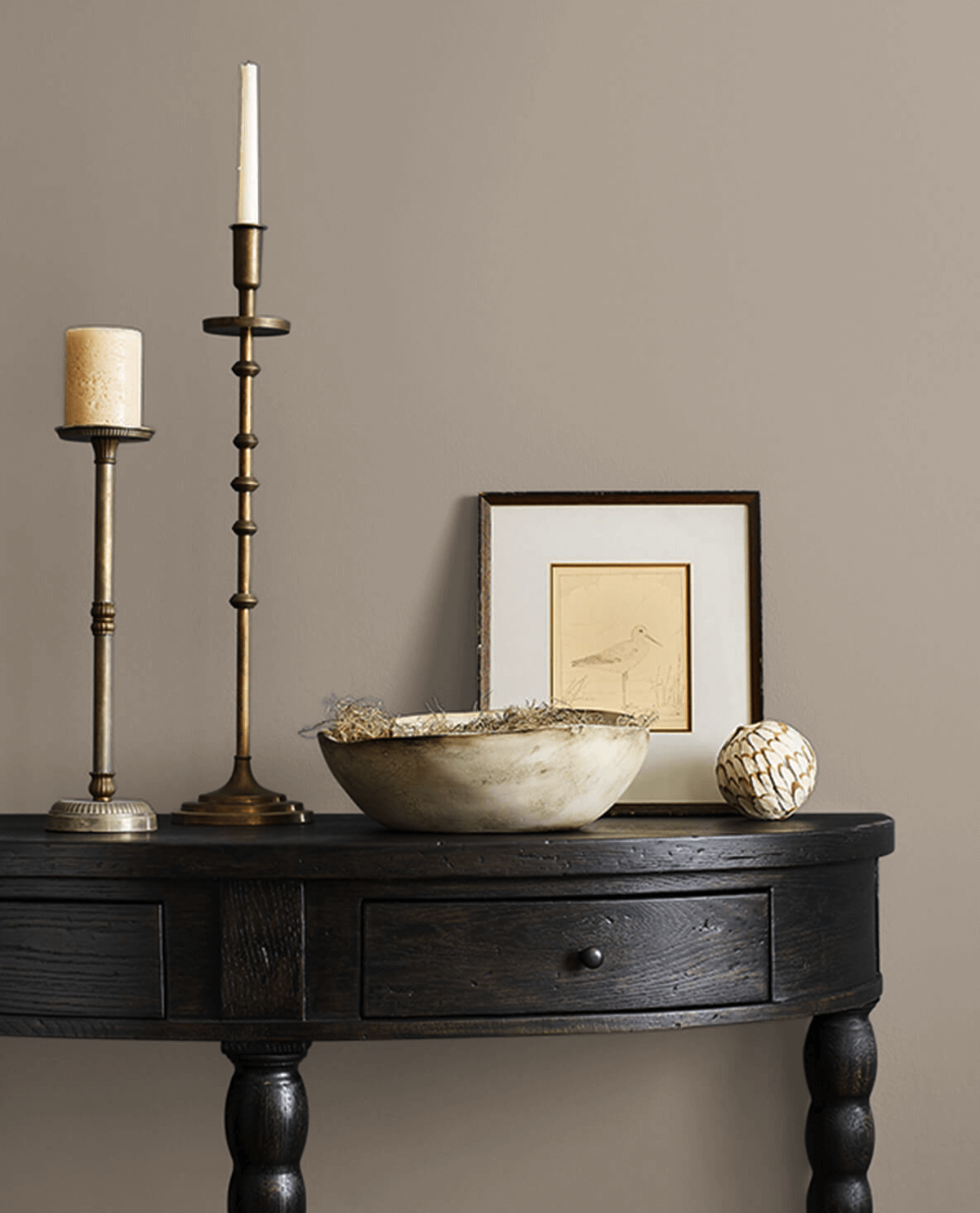 Sherwin-Williams neutral paint color called restoration on a hallway wall.