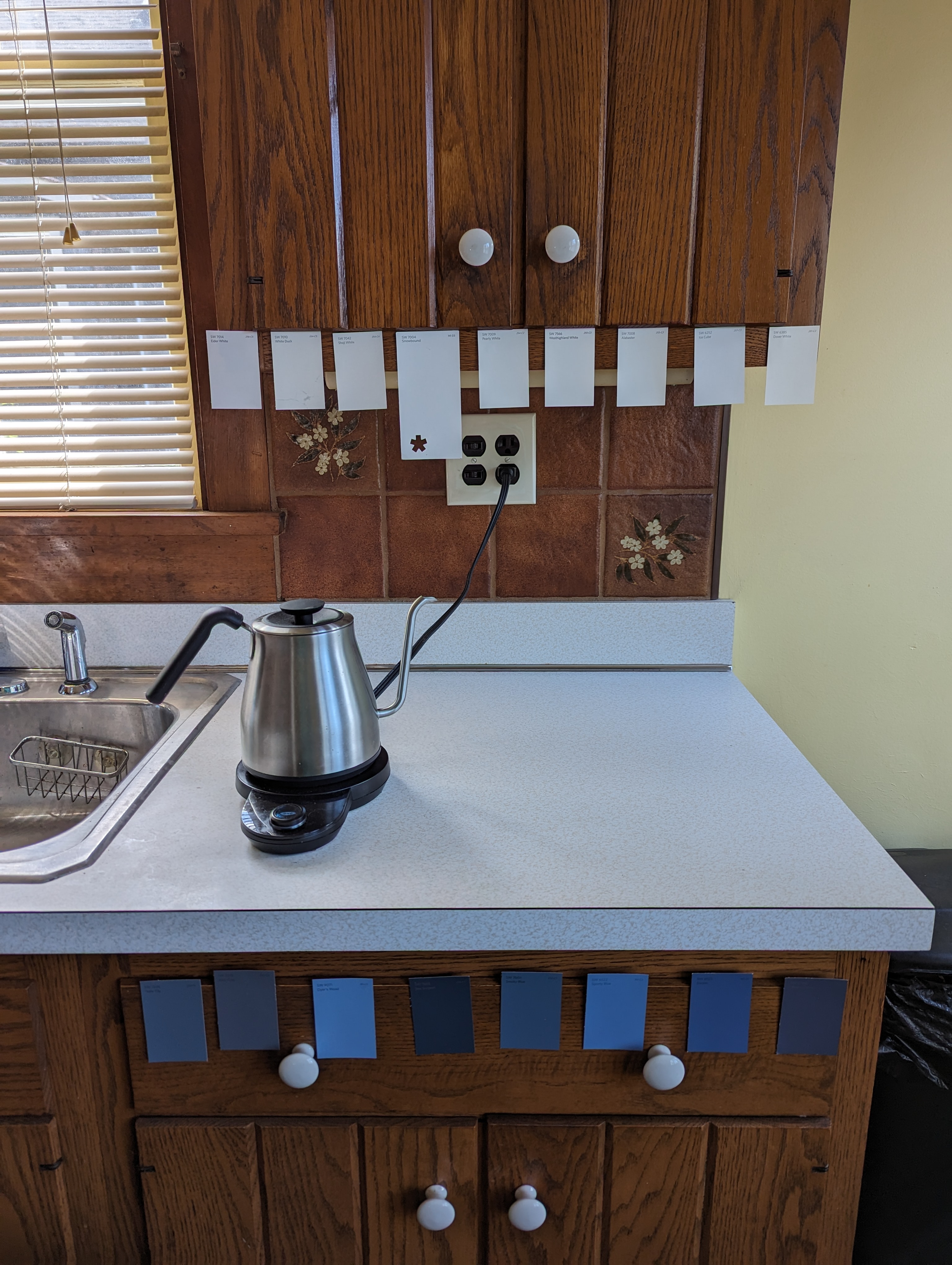After painting the cabinets in my kitchen's "slow reno," I installed a dishwasher