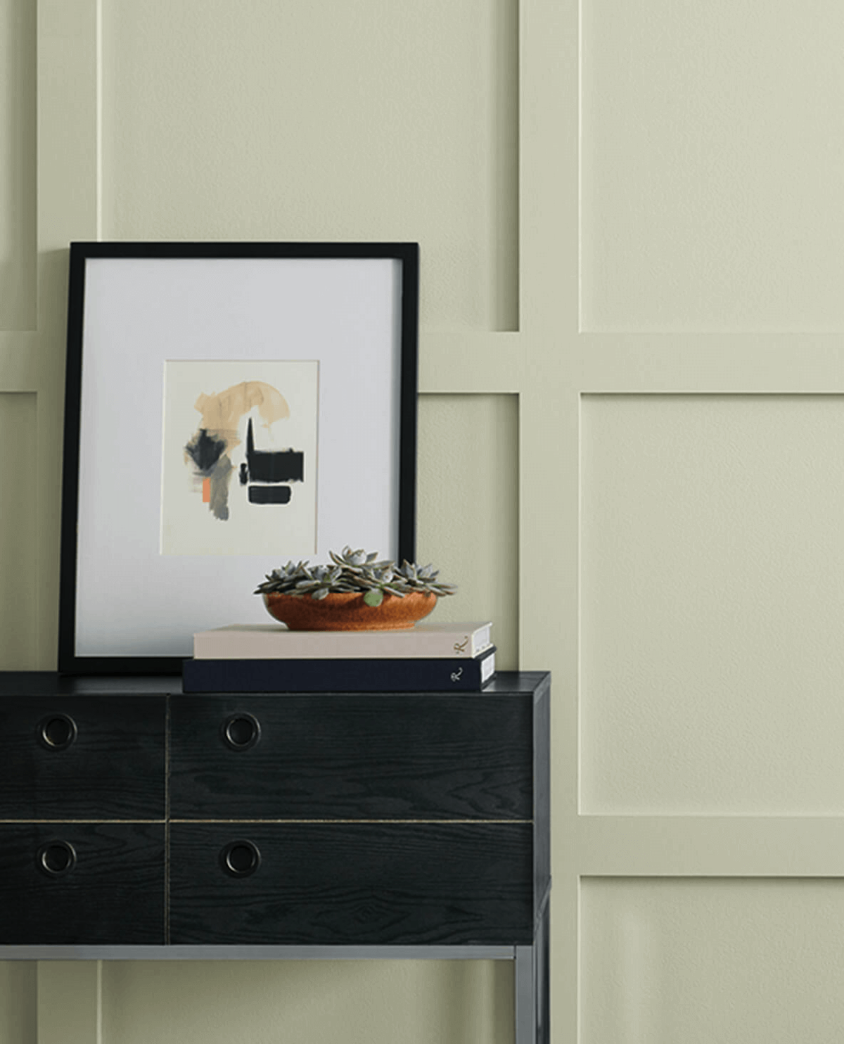 Sherwin-Williams' Liveable Green painted on a decorative wall.