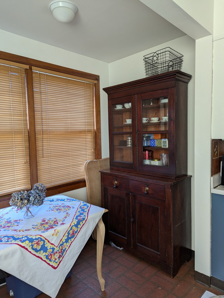 Use the extra time in a slow reno to bring in secondhand treasures, like this hutch