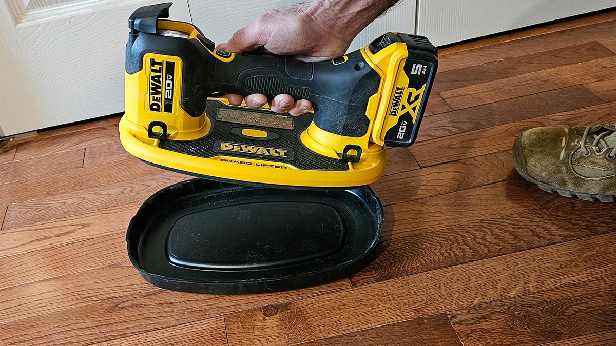 Dewalt Grabo Review hand placing on storage base