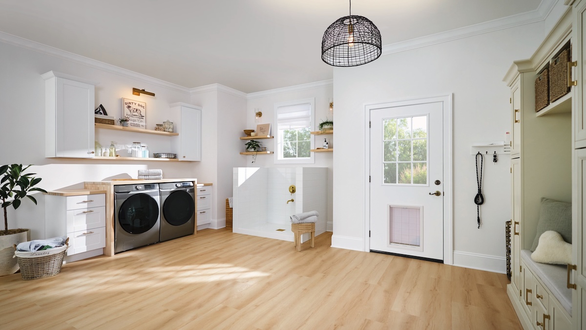 Lifeproof luxury vinyl plank flooring from The Home Depot installed in a laundry room or mud room.