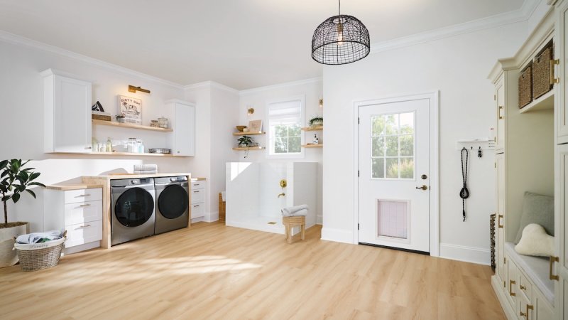 Lifeproof luxury vinyl plank flooring from The Home Depot installed in a laundry room or mud room.