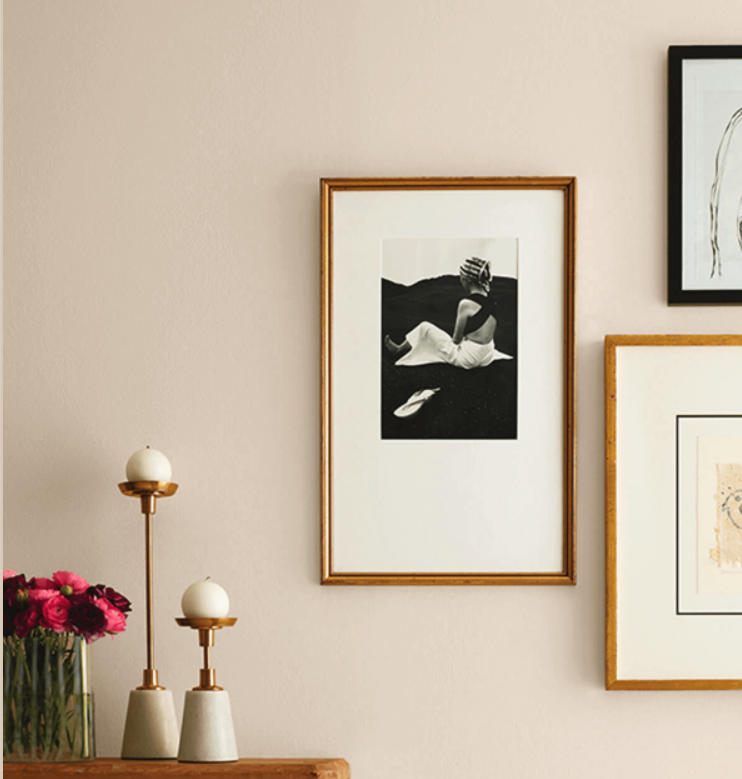 Rivers Edge beige paint from Sherwin-Williams on a dining room wall.