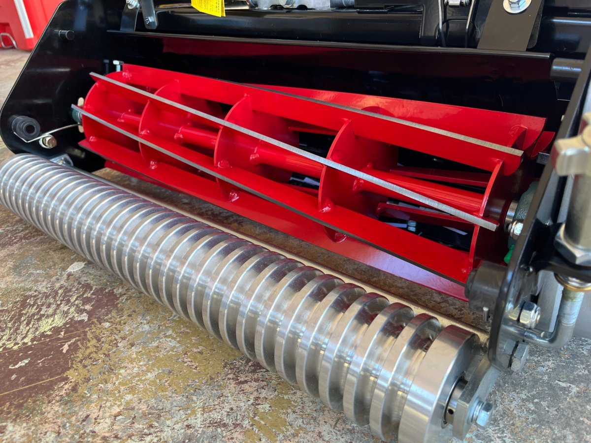 Rolux reel mower front roller and blade assembly