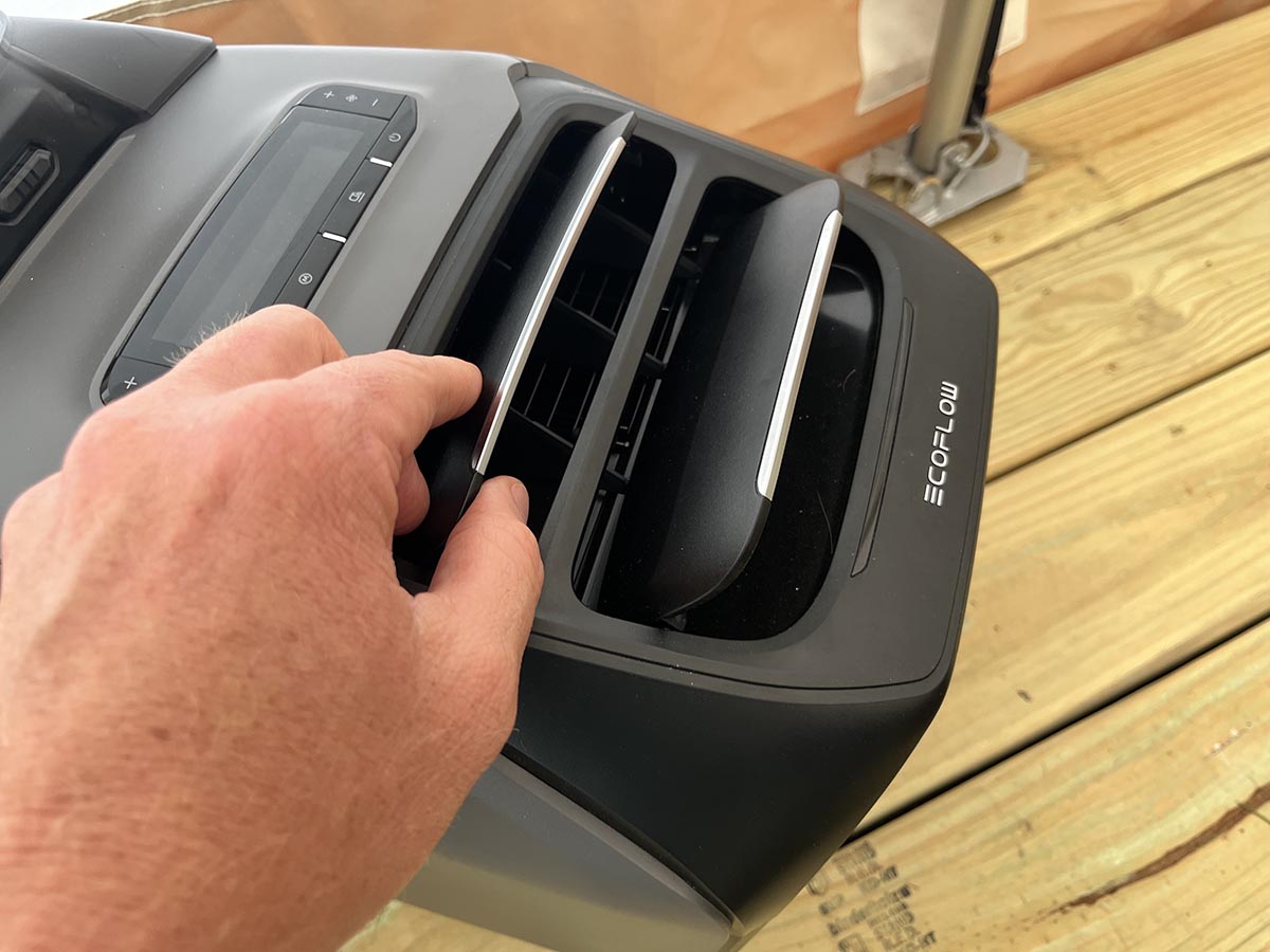 Hand adjusting louvers on EcoFlow Wave 3
