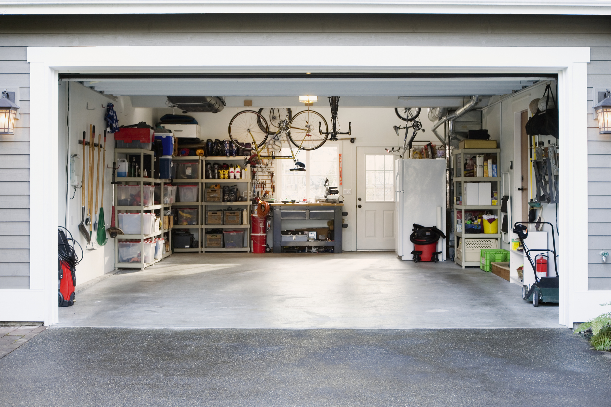Organized garage with bikes and home supplies