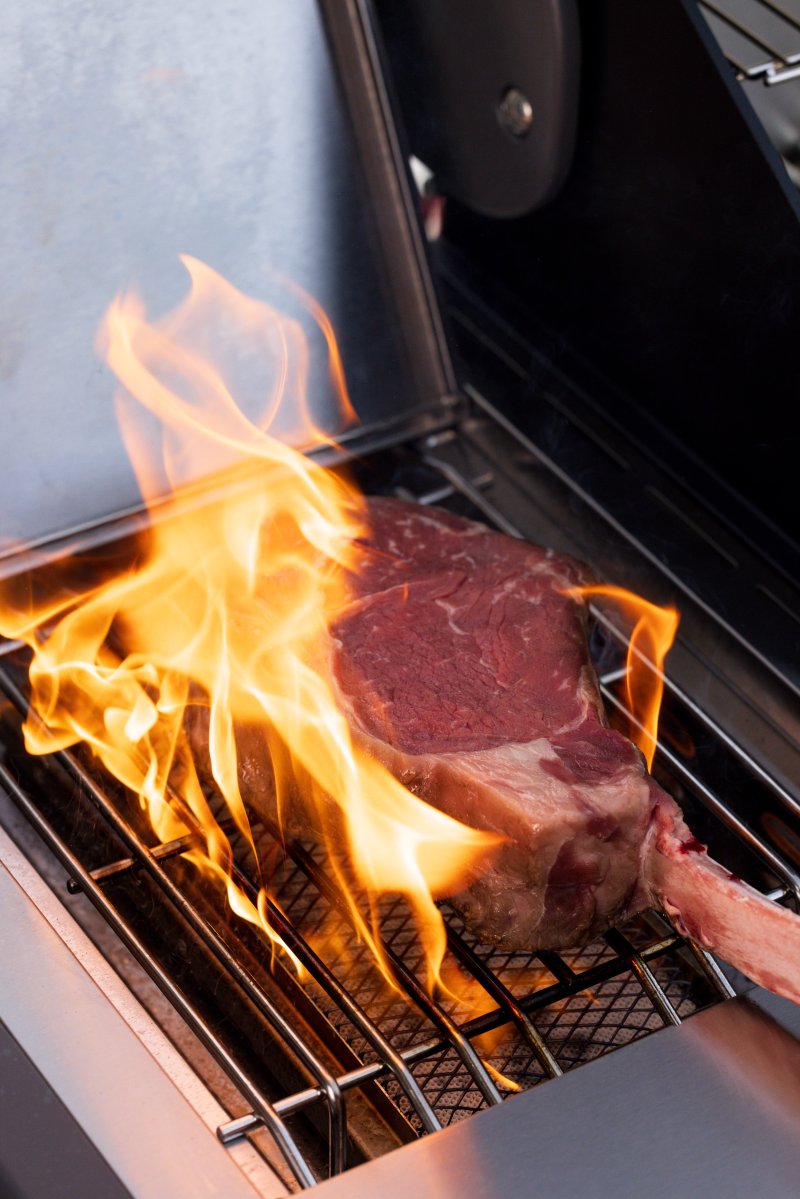 Steak seared on the side burner of Monument Grills' Eminence 605 grill