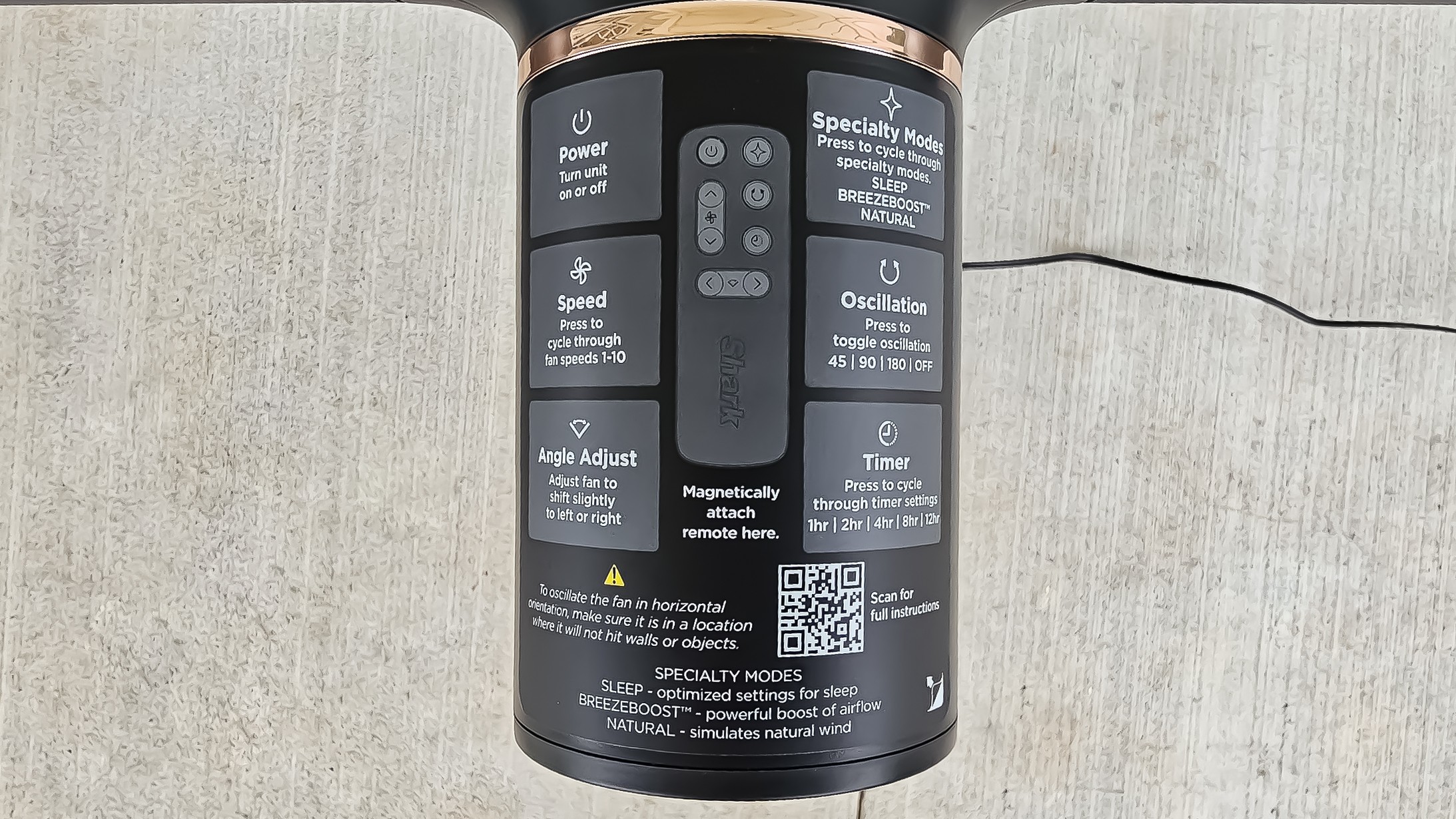 Remote placement and instructions, including QR code on top of fan