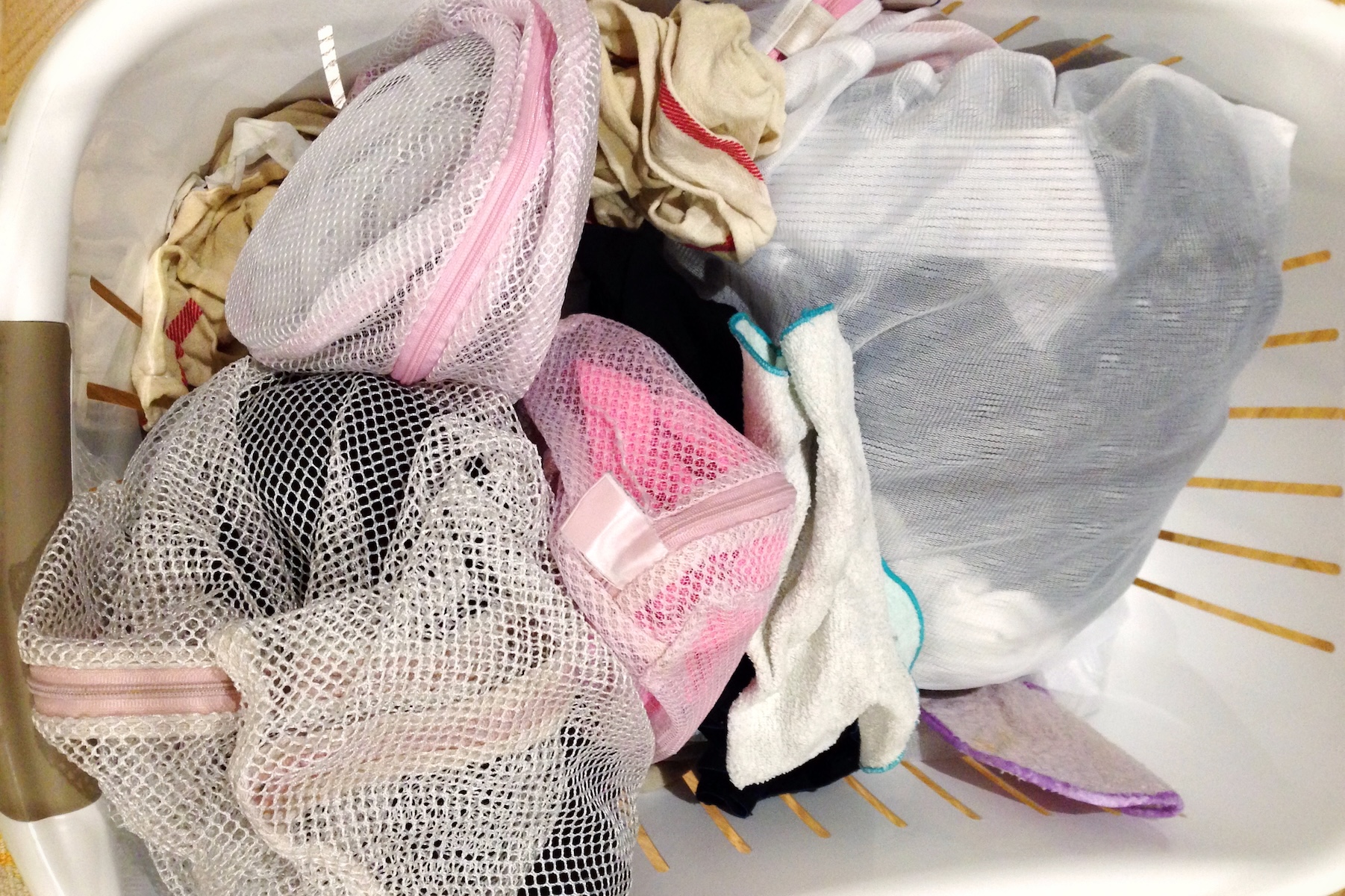 Mesh laundry bags separate laundry.