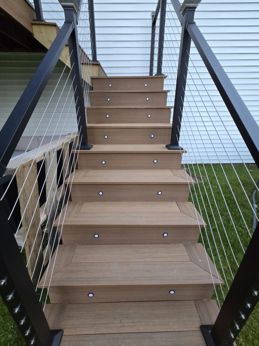 Picture frame stairs with lighting on new composite deck