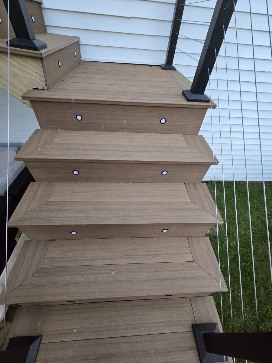 Picture frame stairs with lighting on new composite deck