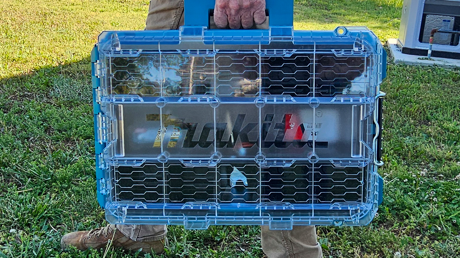 Carrying the Makita MakTrak deep organizer