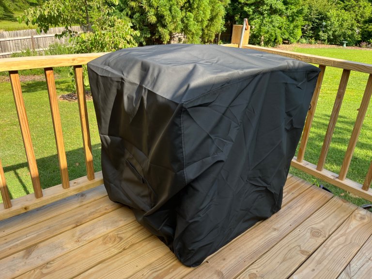 Covers and All installed over grill on a veranda