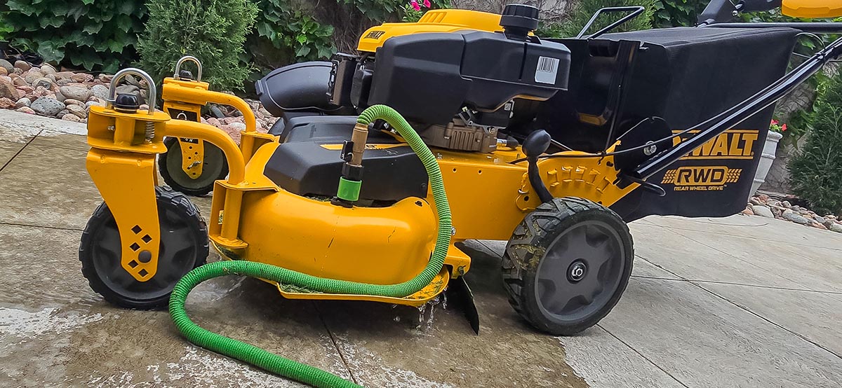 DeWalt Gas Lawn Mower Review Using the Smart Jet port to spray clean the underside of the mower deck