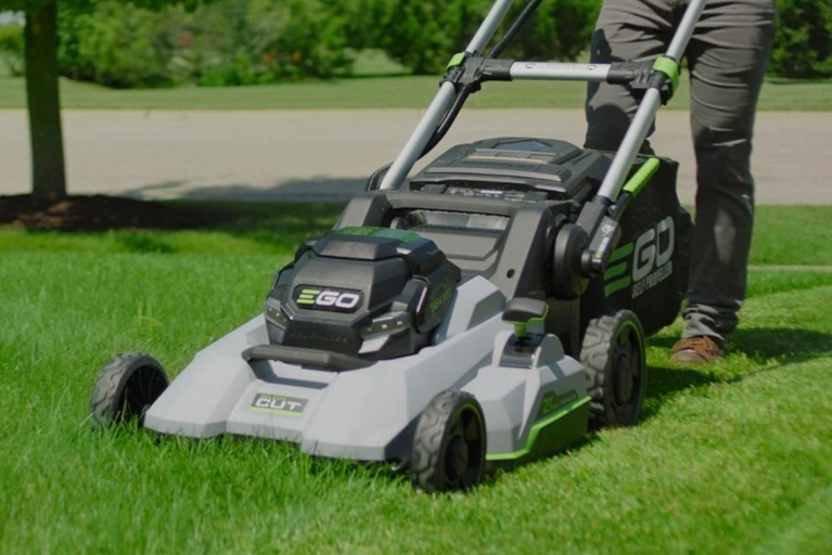 Ego lawn mower LM2135SP in use for free battery deal at lowe's