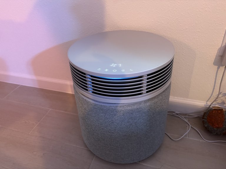 Blue Signature air purifier in a room setting