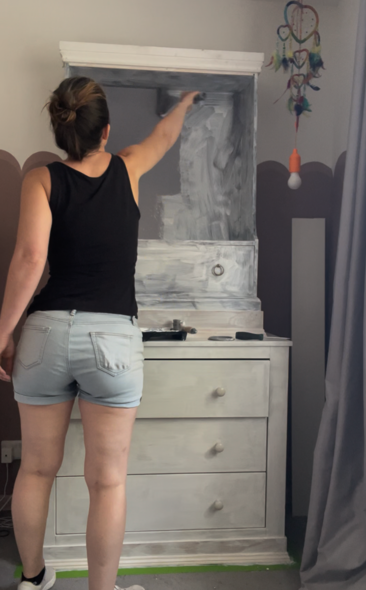 Dawn Allen painting custom hutch project.