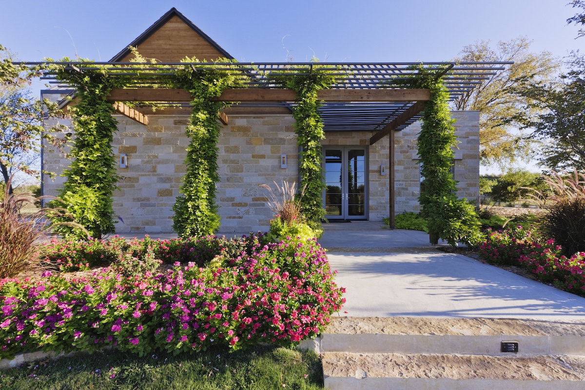 A modern home with vintage Craftsman curb appeal ideas.