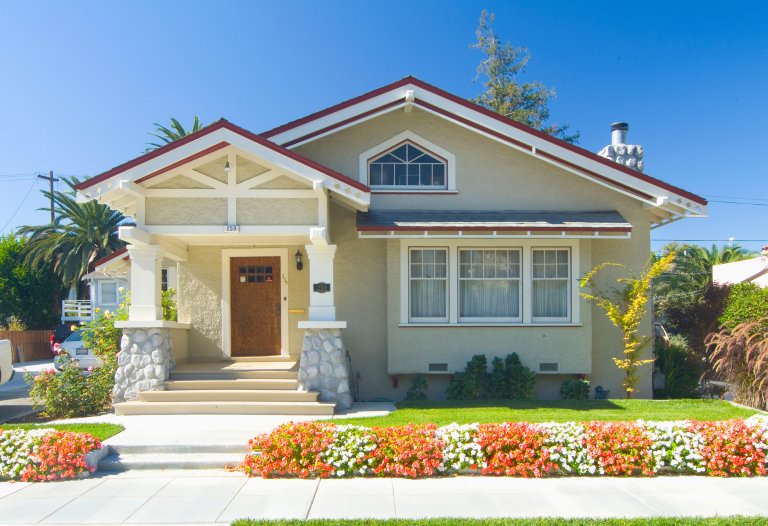 Tan colored Craftsman Style Bungalow house