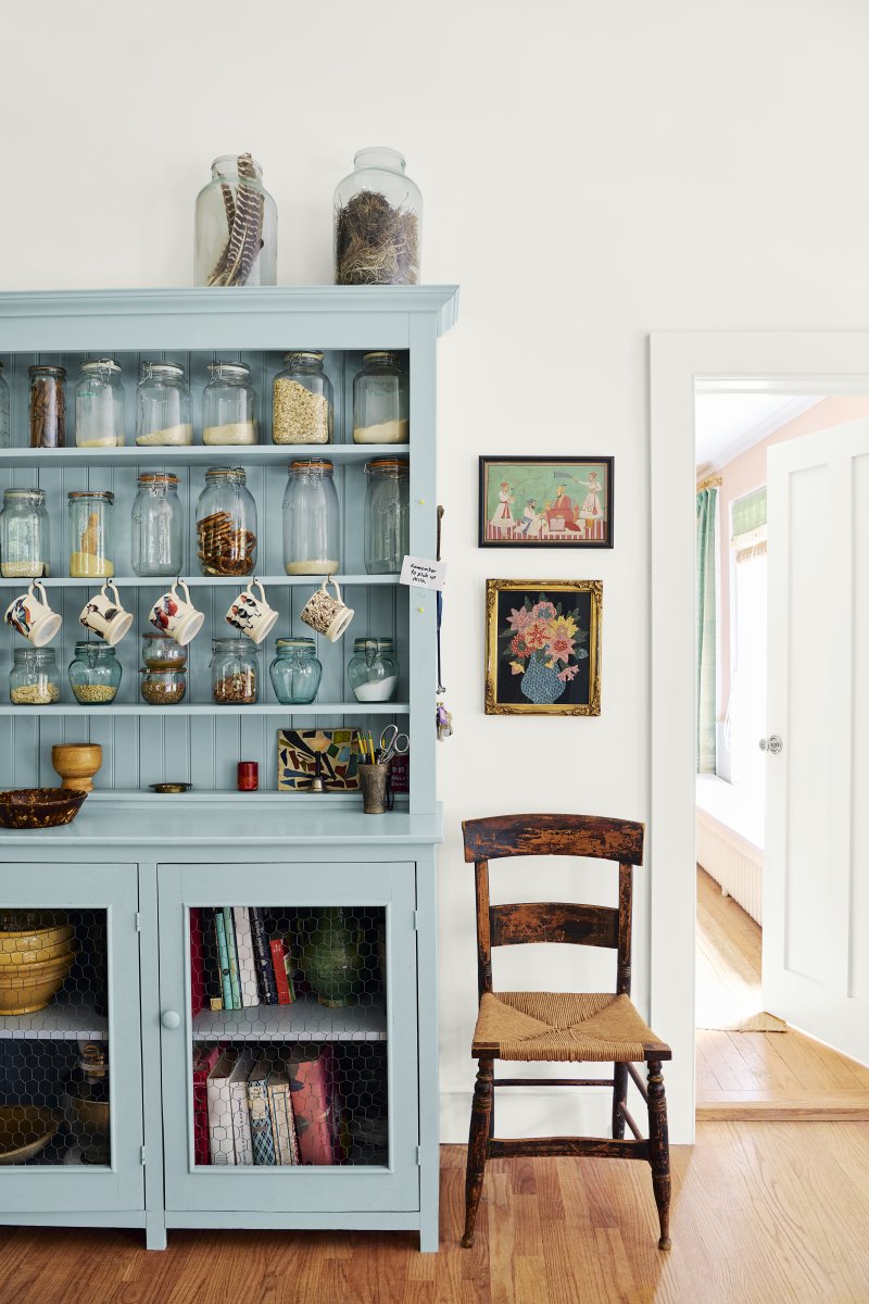 Freestanding cabinet in kitchen painted aqua