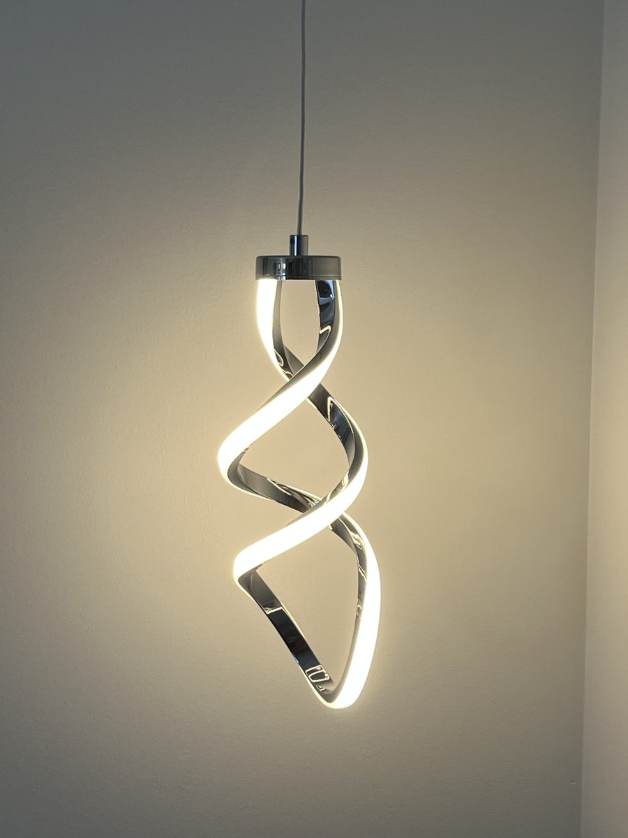 Closeup of modern pendant light with a spiral design