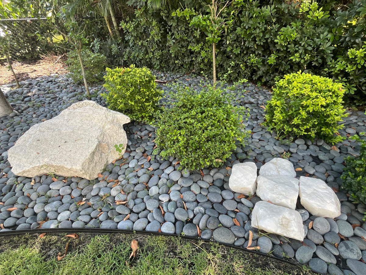 White boulders and stones in backyard meditation garden