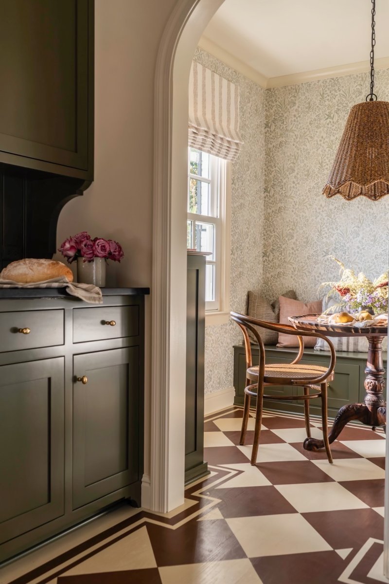 Room with floor painted with brown and cream colored checkered pattern