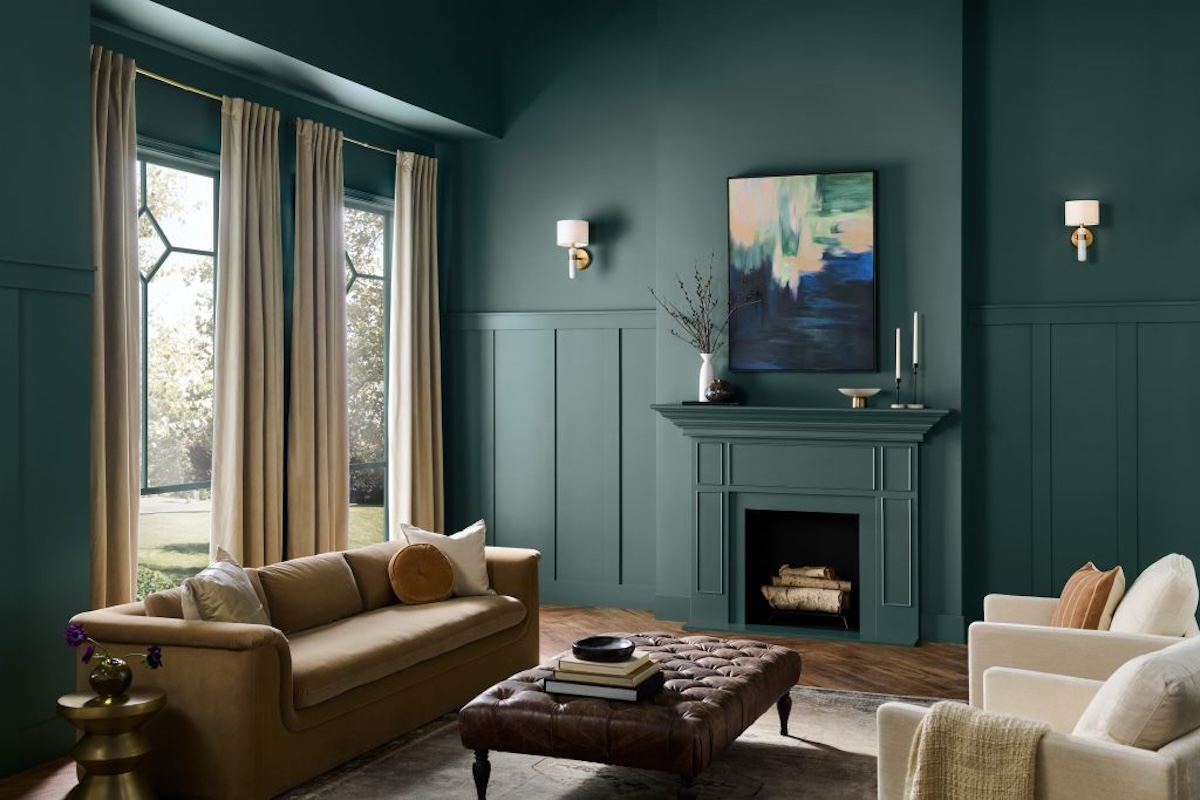 Behr Paint's Hidden Gem, 2025 color of the year, on both walls and trim in a green living room.