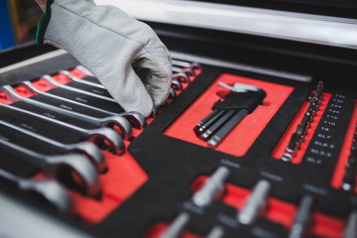 Closeup of tools organized in a toolbox.