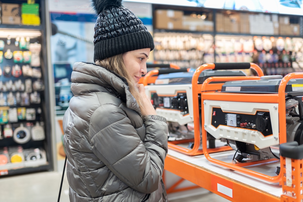 A homeowner shopping for a portable generator for backup power at home.