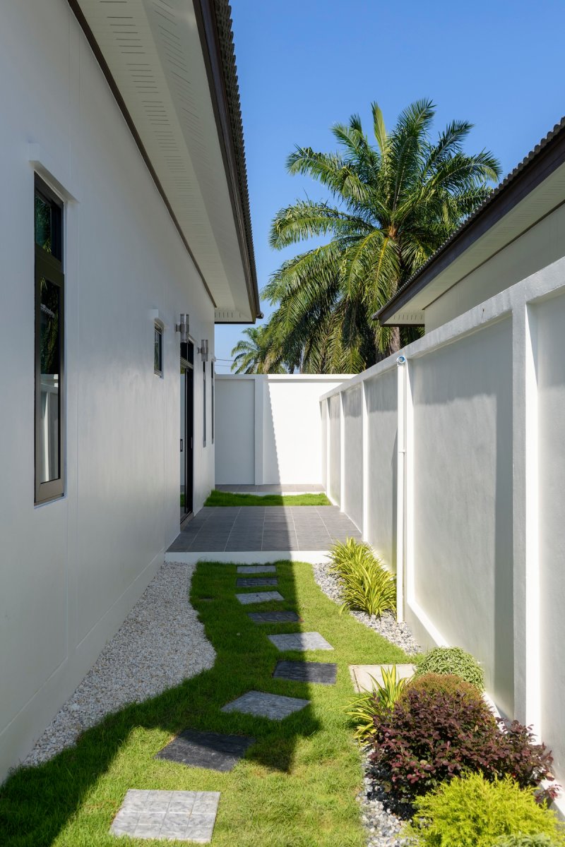A stepping stone garden path in a modern home landscape.