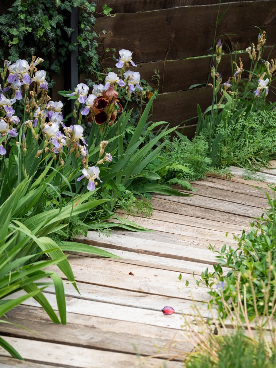 A wood garden path made by a DIYer.