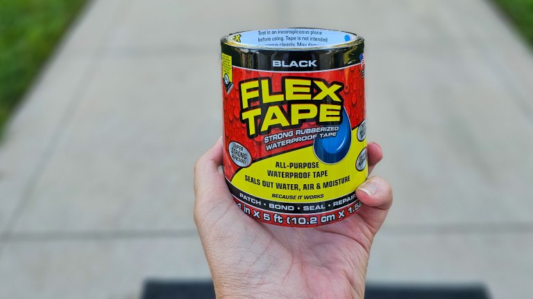 Holding roll of Flex Tape