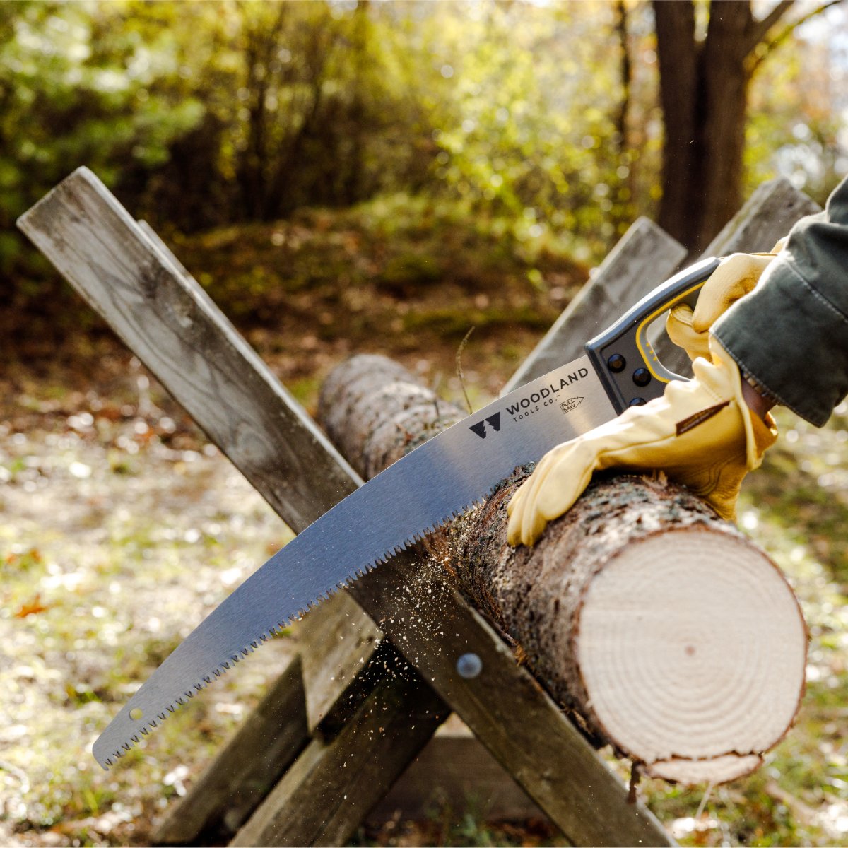 Woodland Super Duty Saw slicing through a fallen tree