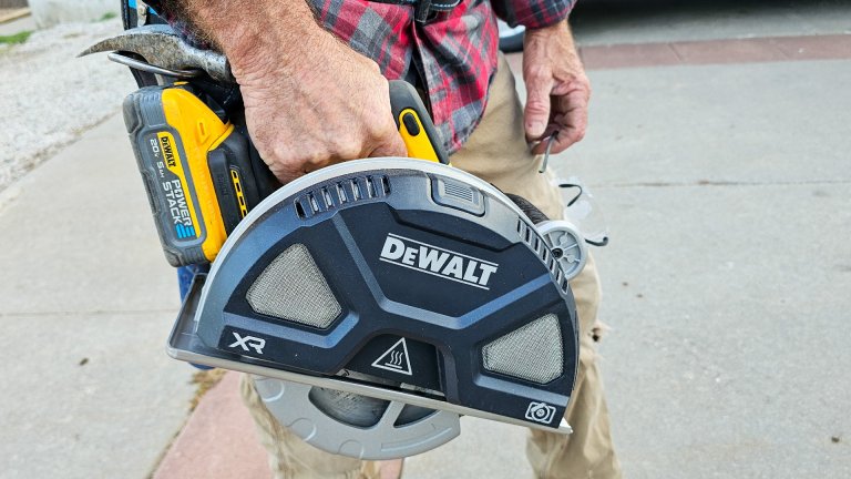 Carrying the DeWalt DCS383B Metal-Cutting Circular Saw