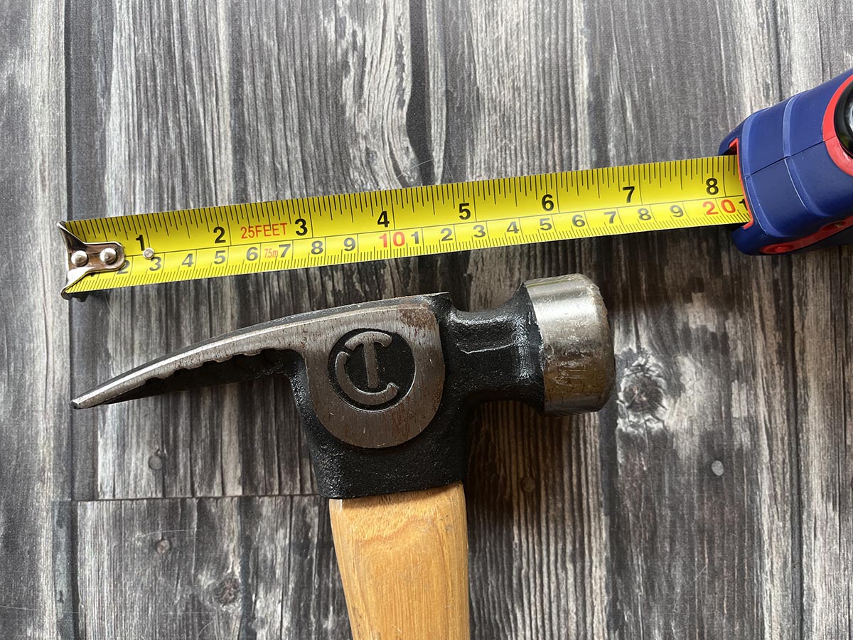 Crescent framing hammer width shown with tape measure