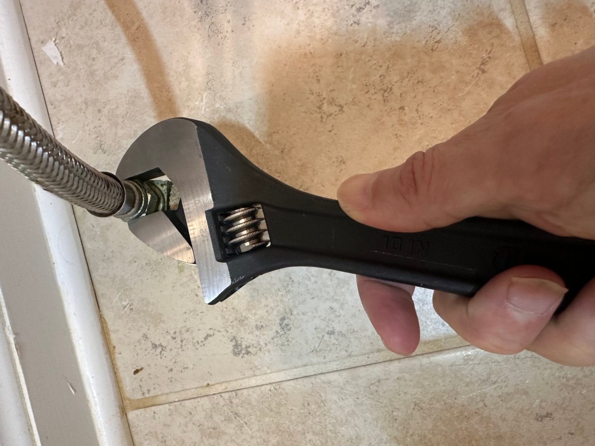 Crescent wrench head adjusting toilet valve