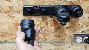 Storing heads on wall mount