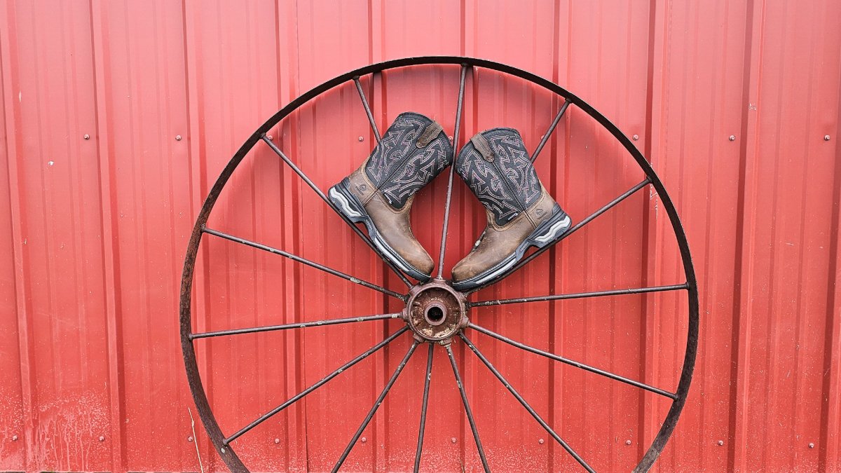  Wolverine Rancher Boots on Wagon Wheel
