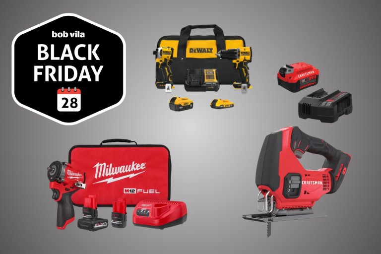 Multiple power tools on a gray background