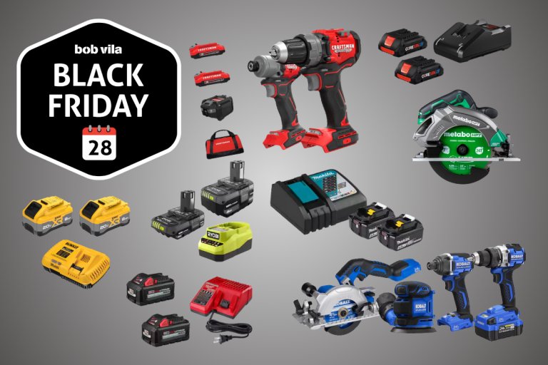 Multiple power tools on a grey background